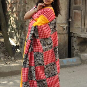 The Kalamkari-Gamcha Fusion Dhonekhali Cotton Yellow Saree